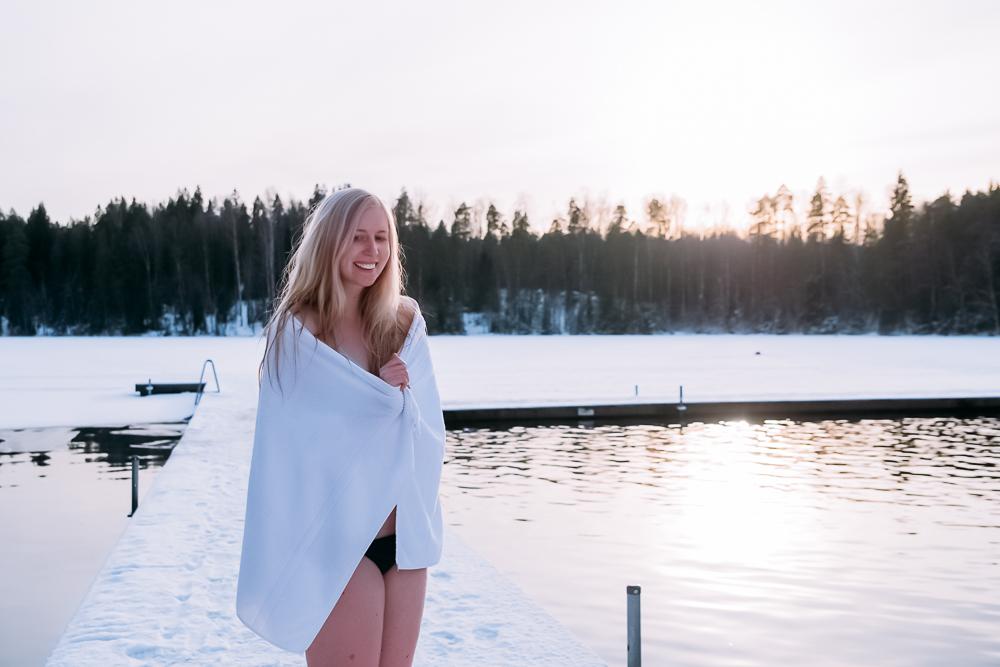 finnish sauna winter ice frozen lake swimming finland