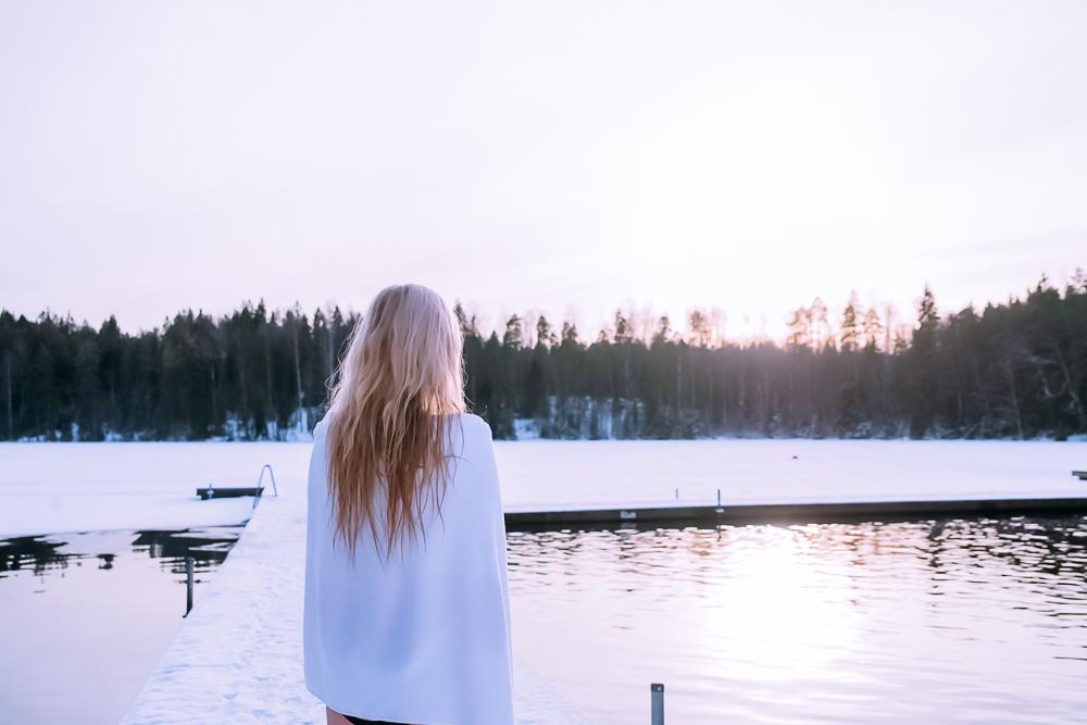 Kuusijärvi lake sauna experience Finland jumping in ice winter