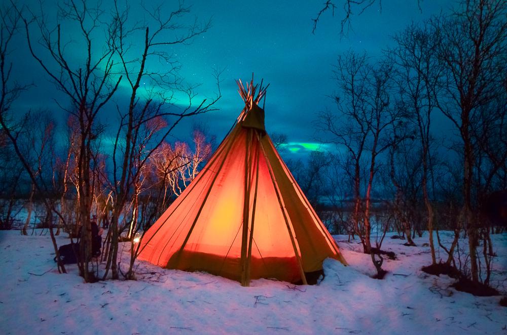 abisko northern lights photo tepee lights over lapland sweden