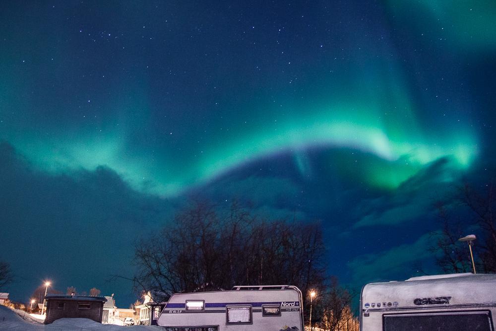 pink and green aurora in abisko sweden lapland photo