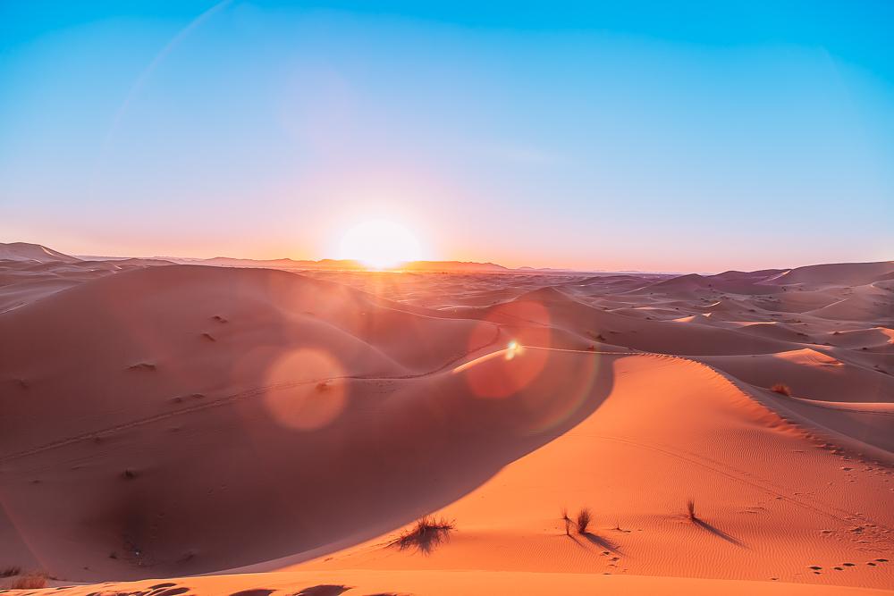 sahara desert camel trek tour merzouga morocco sand dunes photo sunset
