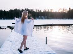 Kuusijärvi lake sauna experience Finland jumping in ice