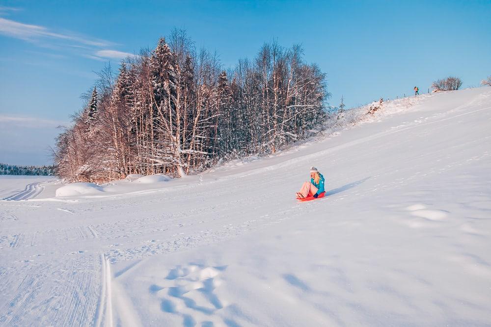 sledding finnish lapland winter