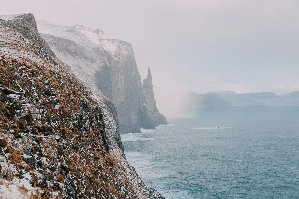 Trøllkonufingur troll woman's finger faroe islands with snow