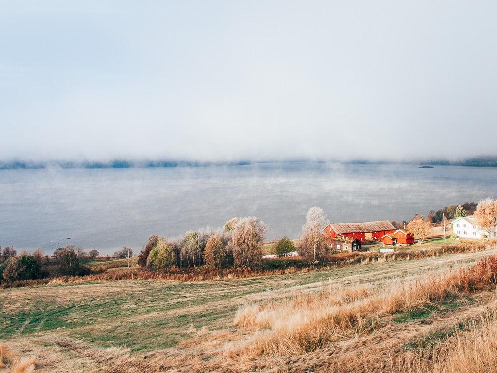 autumn in norway, rauland telemark fog and frost on the lake